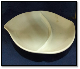 صورة طبق صينى ابيض مسطح على شكل سمك